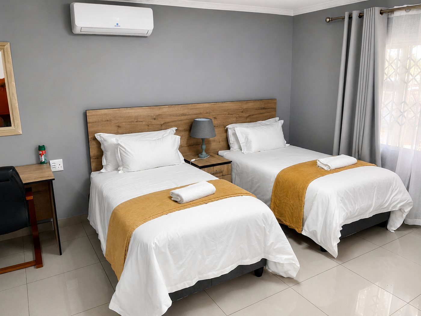 Comfortable twin room at Mashobs Guest House